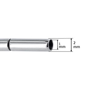May include: A silver metal tube with a 1 mm inner diameter and a 2 mm outer diameter.