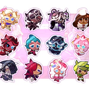 May include: A collection of colorful cartoon character stickers. Each sticker features a unique character design with various colors and details. One sticker has the word "NEW!" in the upper left corner. The stickers are on a pink background.