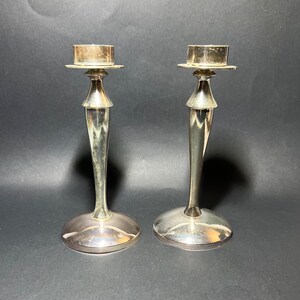 Pair of art deco silver candlestick holders