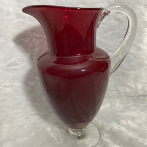 Ruby red glass blown footed water pitcher