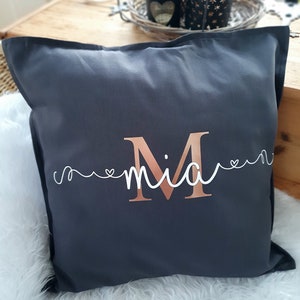 Pillow with name, initial letter, heart writing