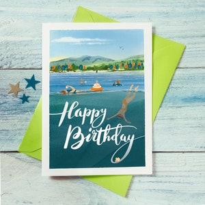 Carte d'anniversaire représentant un gâteau pour les nageurs sauvages