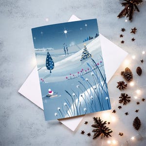 C'est la saison n°2. Carte de Noël de natation sauvage