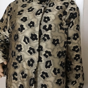 Women’s dressy special occasion animal print mid length loose fitting evening wear coat with side pockets