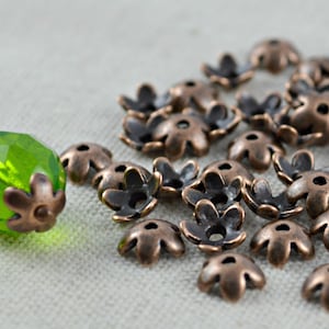 50 kleine Perlenkappen Blümchen kupfer 6,5mm Bild 1