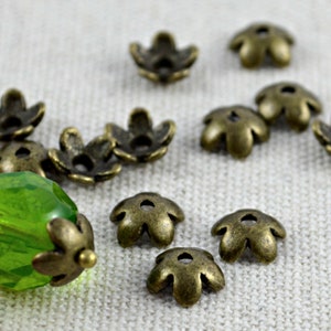 50 kleine Perlenkappen Blümchen antik bronze 6,5mm Bild 2