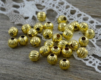 30 metal beads spacer beads gold 6 mm grooves