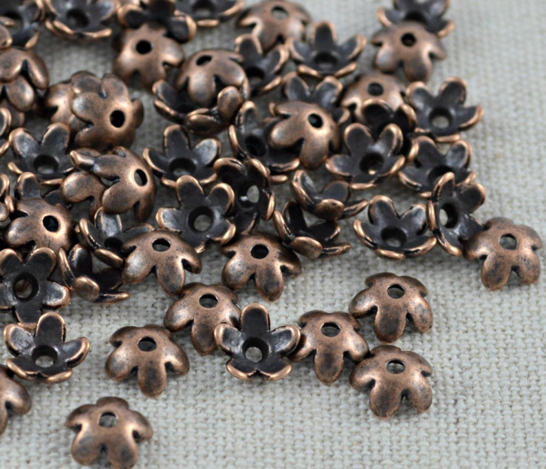 50 kleine Perlenkappen Blümchen kupfer 6,5mm Bild 2
