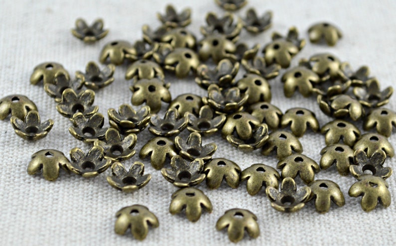 50 kleine Perlenkappen Blümchen antik bronze 6,5mm Bild 4