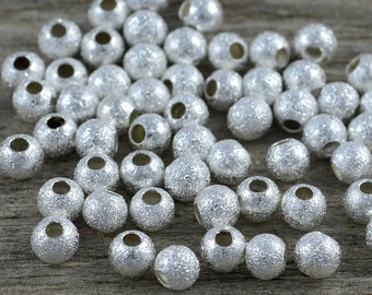 20 perles métalliques STARDUST 6 mm argent spacer