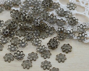 100 Perlenkappen Blümchen, Bronze - 6 mm