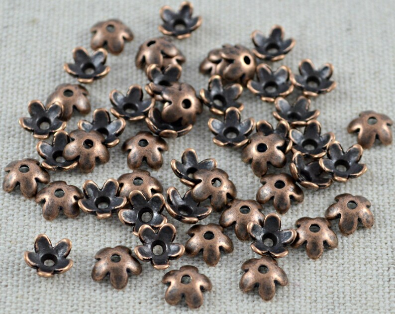 50 kleine Perlenkappen Blümchen kupfer 6,5mm Bild 3