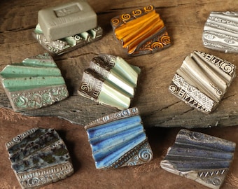Wavy, square ceramic soap dish made of black clay. Unique pieces with stamped patterns in various colors. Soap dish "Dry wave small"