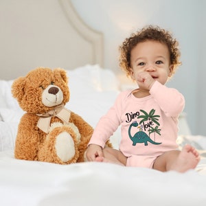 Blue Stork Baby Body "Dino Love, little cute dino with bird on the back" saying gift birth for toddler long sleeve organic cotton
