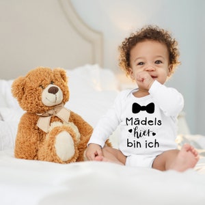 Body bébé cigogne bleue « Girls Here I Am » Cadeau de naissance avec nœud papillon pour tout-petits à manches longues en coton biologique