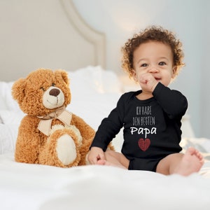 Body de bebé Cigüeña azul &quot;Tengo el mejor papá&quot; Regalo de corazón para el nacimiento en el cumpleaños para niño pequeño Algodón orgánico de manga larga
