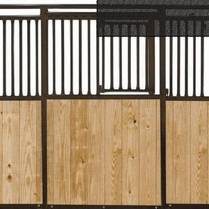 May include: A brown metal horse stall with a wooden panel and a black metal top. The stall has a horizontal slatted design.