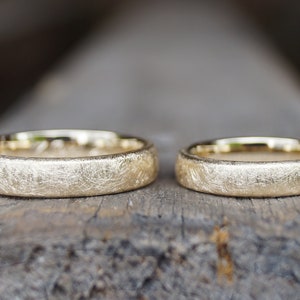 Wedding rings "We two" matt yellow gold