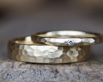 Wedding rings "we stay" hammered forged 333/- yellow gold partner rings