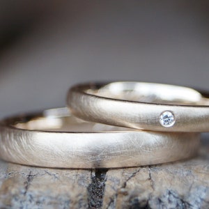 Wedding rings "we stay" delicately matte rose gold 333/- with 1 brilliant-cut diamond