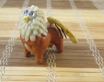 mini-griffin figurine; handmade clay creautres