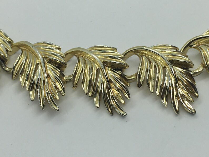 Lisner gold leaf clip earring and necklace set