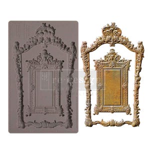 May include: An ornate, antique-style picture frame in a bronze finish, next to a gray silicone mold of the same design. The frame features intricate scrollwork and a rectangular center, perfect for adding a vintage touch to decor.