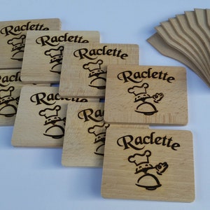 Raclette set 16 pieces. made of wood 8 sliders + 8 boards