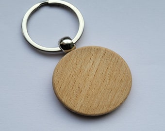 Schlüsselanhänger runde Form aus Holz mit personalisierter Lasergravur