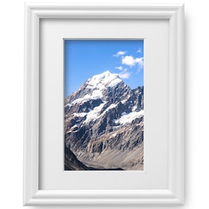 8x10 White Picture Frame Matted to 5x7 for Wall Solid Wood White Picture Frame with UV Blocking Plexiglass and Preinstalled Hangers