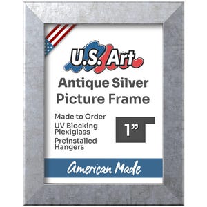 May include: Antique silver picture frame with a 1 inch wide frame. The frame is made in the USA and features UV blocking plexiglass and preinstalled hangers.