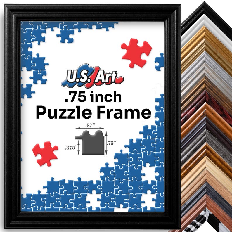 May include: Black picture frame with a white background and a blue and red puzzle design. The frame is .75 inches wide and is labeled "U.S. Art .75 inch Puzzle Frame".