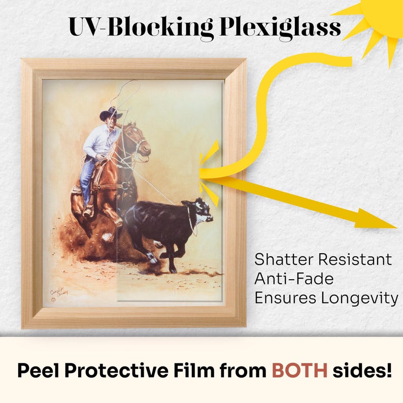 May include: A framed picture of a cowboy roping a calf, protected by UV-blocking shatter-resistant plexiglass. The plexiglass has a protective film on both sides.  "UV-Blocking Plexiglass", "Shatter Resistant", "Anti-Fade", "Ensures Longevity", and "Peel Protective Film from BOTH sides!" are written on the image.