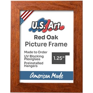 May include: A red oak picture frame with a 1.25 inch wide frame. The frame is made to order and features UV blocking plexiglass and preinstalled hangers. The frame is American made.