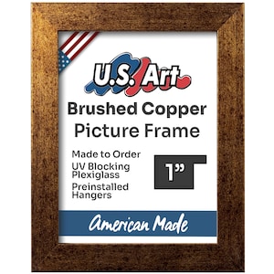 May include: A brushed copper picture frame with a 1-inch wide frame. The frame is made in the USA and features UV blocking plexiglass and preinstalled hangers.