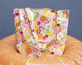 Vitamin C booster. Fruit cocktail served on colorful Canvas, a perfect bag for heavy groceries.