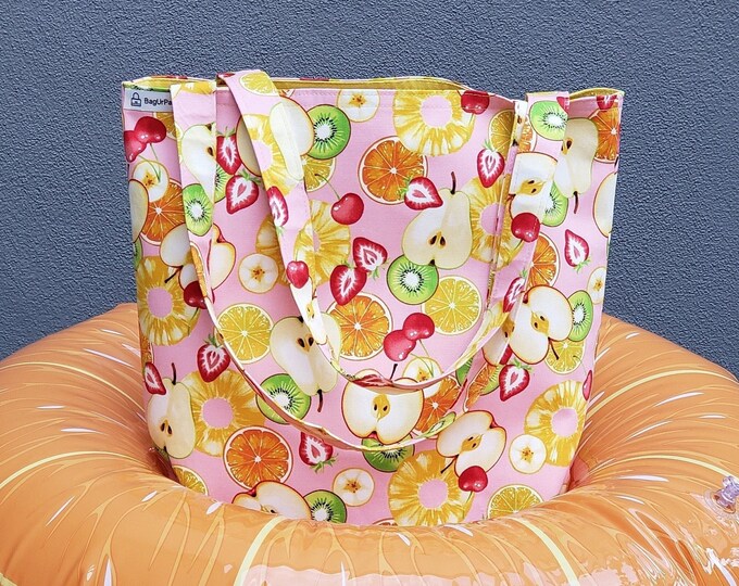 Vitamin C booster. Fruit cocktail served on colorful Canvas, a perfect bag for heavy groceries.