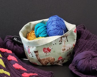 A yarn basket for knitters and crocheters. Cozy sheep and alpaca gifting.