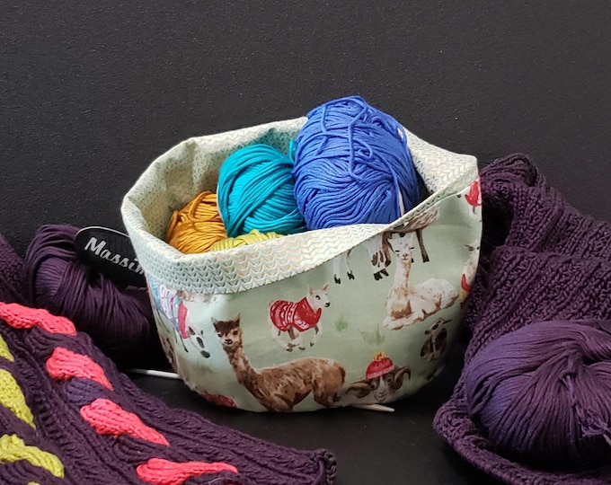 A yarn basket for knitters and crocheters. Cozy sheep and alpaca gifting.