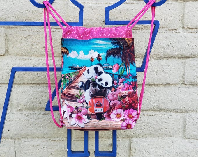 A Panda Bear bag for kids. Hop on your scooter and head to the beach!