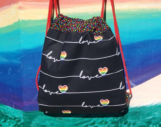 A love letter sports bag with rainbow hearts. I can feel your heartbeat.