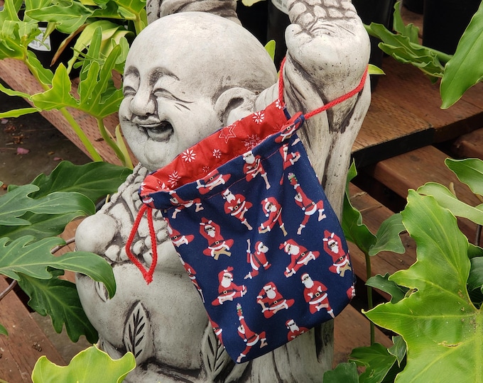 Santa Claus Yoga gift bags. Escape the Holiday stress. Relax. Breathe.