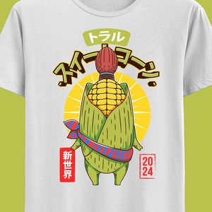 May include: White t-shirt with a cartoon corn cob wearing a hat and a sash. The text on the shirt says "Trail", "New World", "2024", and Japanese characters.