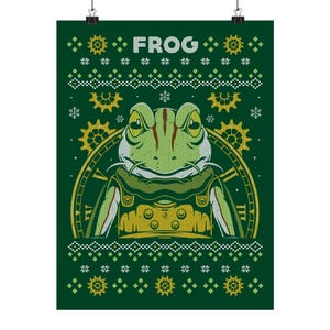 May include: A green poster with a frog design. The frog is green and white with a steampunk-inspired outfit. The word "FROG" is at the top in white letters. The background is dark green with snowflake and gear patterns.