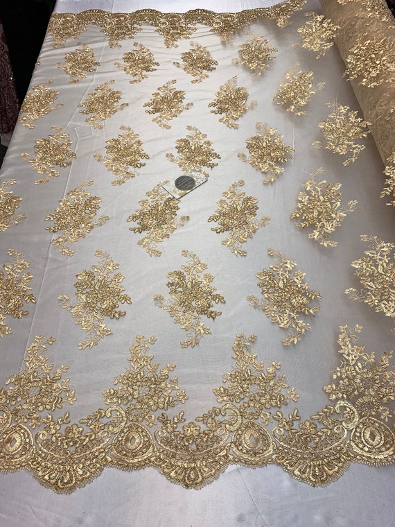 DIAMOND WHITE HAND BEADED FLORAL DESIGN EMBROIDERY ON A MESH LACE-SOLD BY YARD.