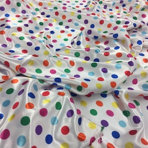 Satin Polka Dots Multi color Fabric By Yard dresses particularly evening wear linings bedspreads and upholstery.