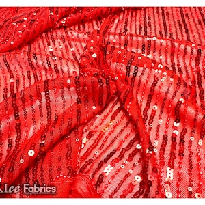 May include: Red sequined fabric with vertical stripes of sequins. The sequins are evenly spaced and create a shimmering effect.