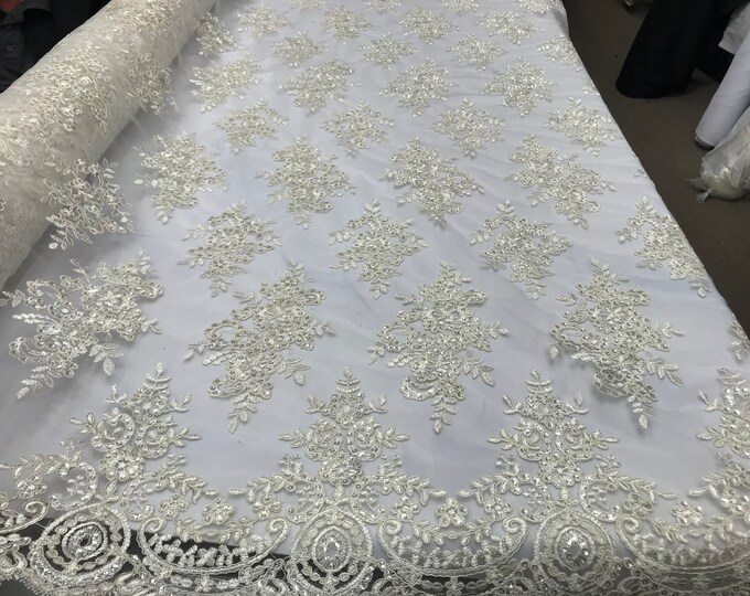 Off White modern flower design embroider on a mesh with sequins and metallic cord-prom-nightgown-decorations-sold by the yard.