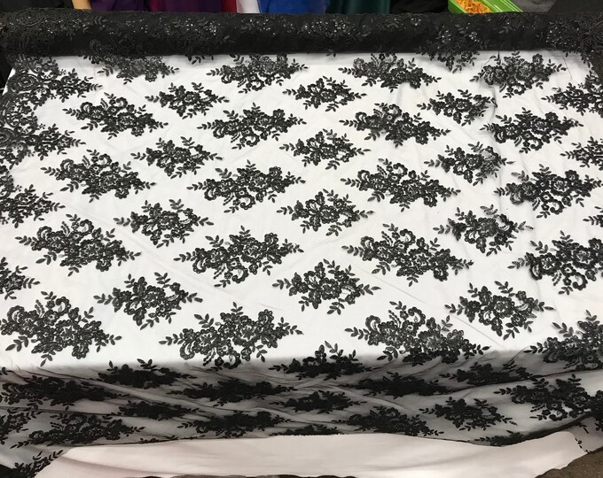 Black modern flower design embroider on a mesh with sequins and metallic cord-prom-nightgown-decorations-sold by the yard.