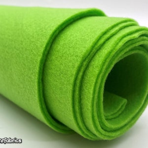 May include: A roll of bright green felt fabric. The felt is soft and smooth, and it is perfect for crafting projects.